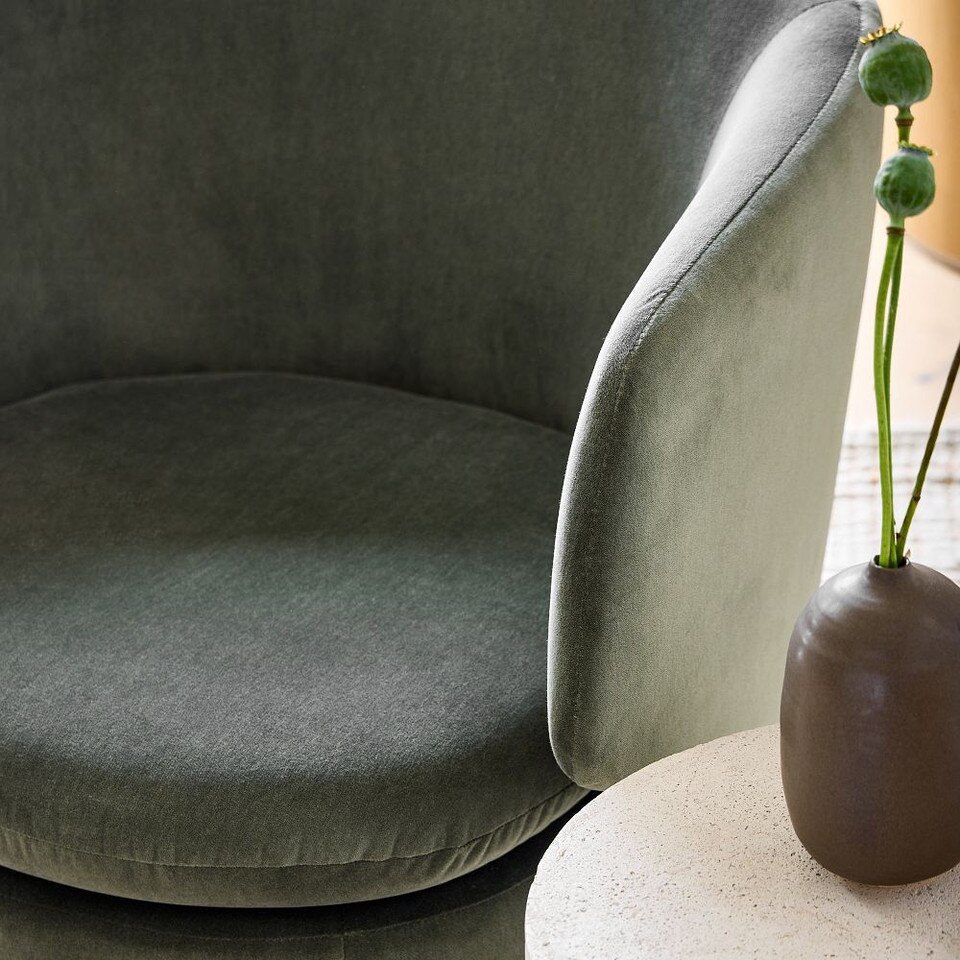 Crescent Swivel Armchair